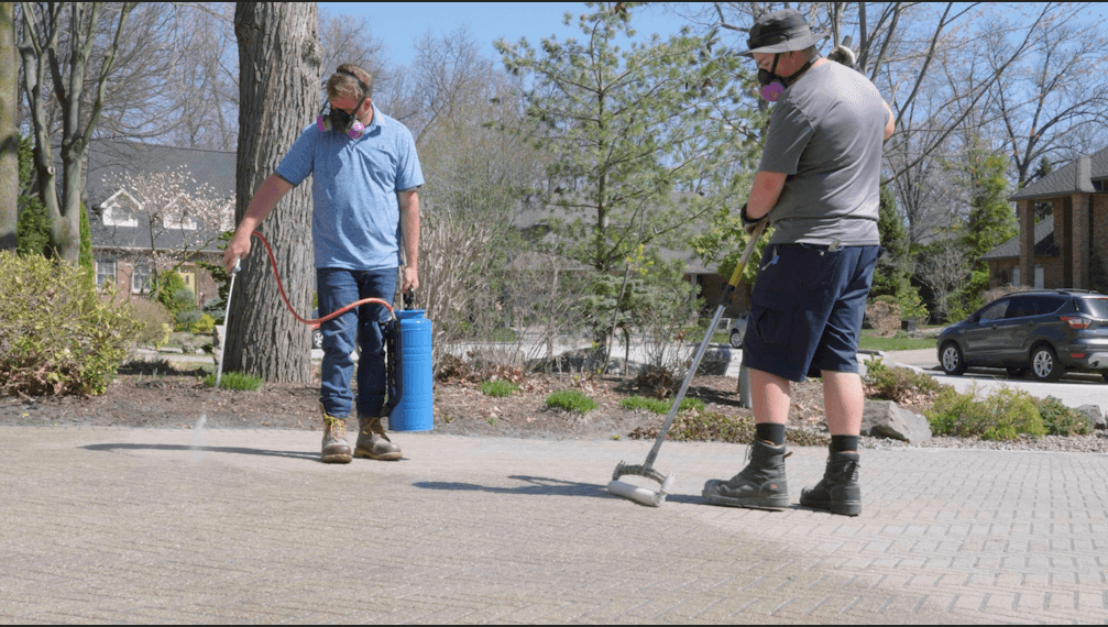 Concrete driveway sealed and protected with professional sealer in Windsor Ontario by Preferred Coating Solutions