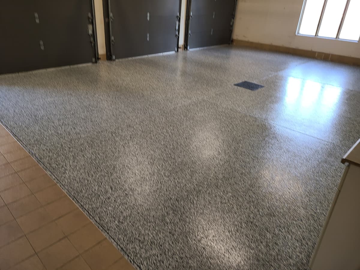 Epoxy coated garage floor with professional flake finish in Windsor-Essex County
