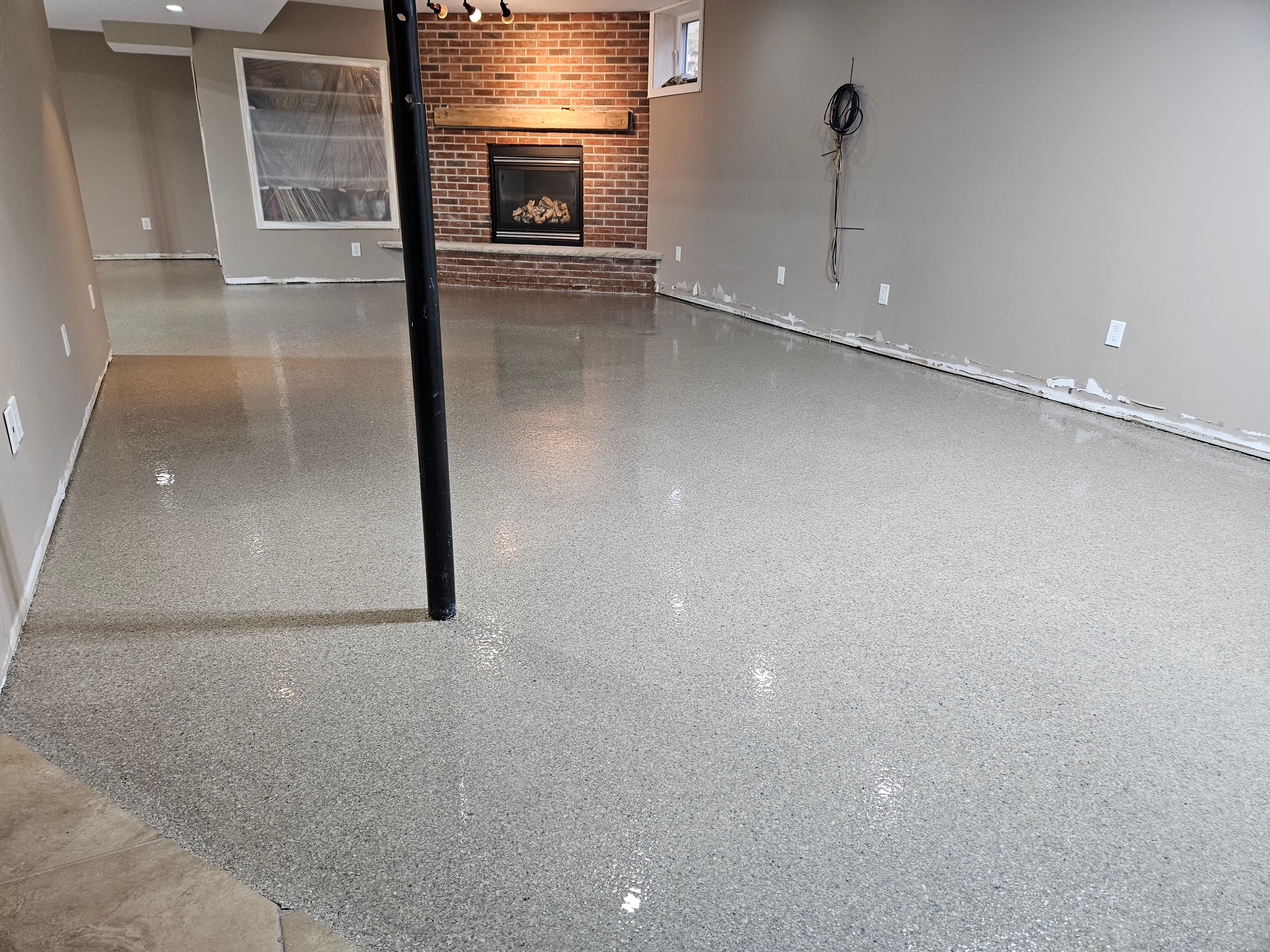 Professional basement epoxy floor installation in Windsor Ontario by Preferred Coating Solutions