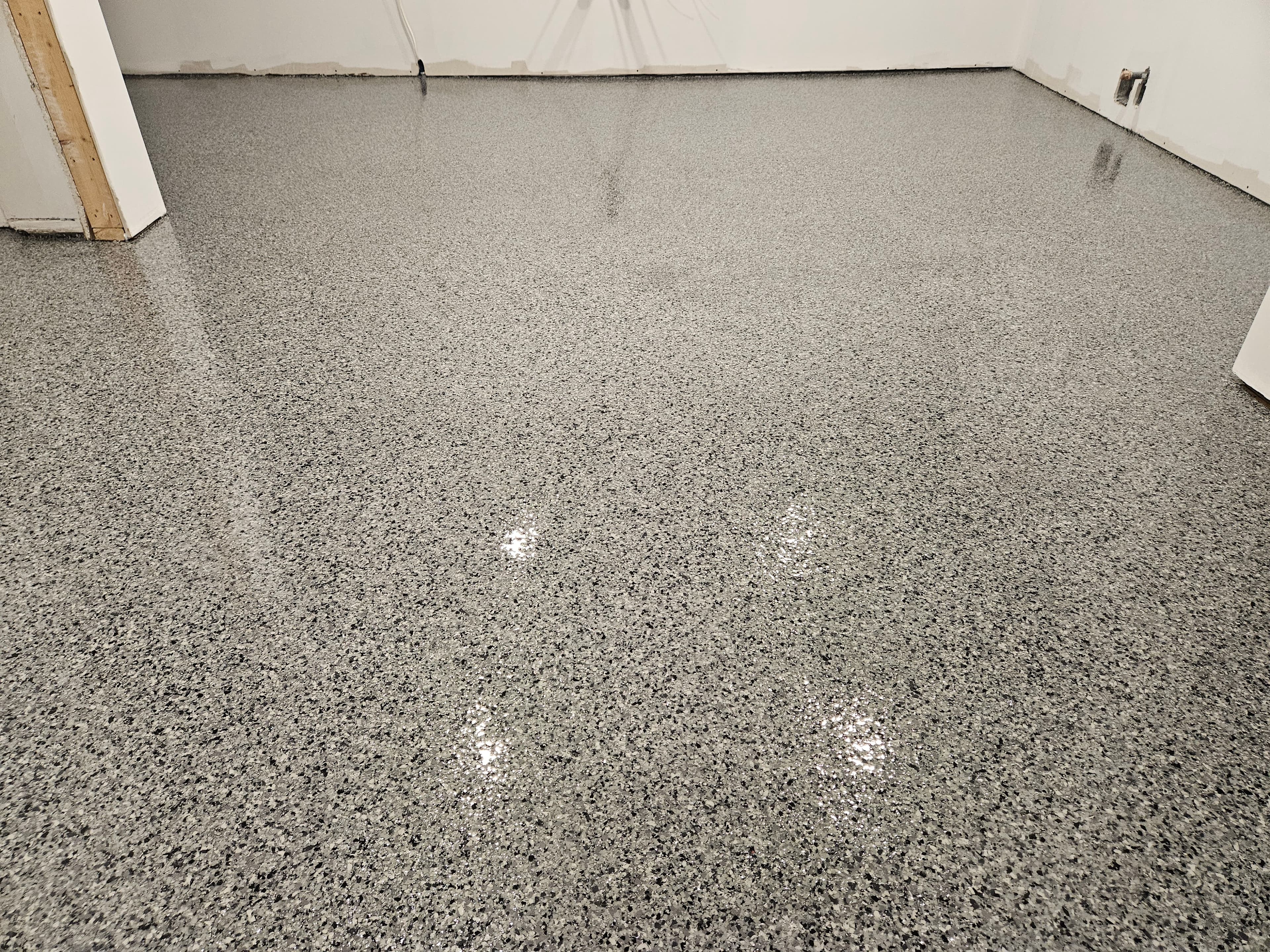 Premium epoxy finish on garage floor in Windsor Ontario by Preferred Coating Solutions