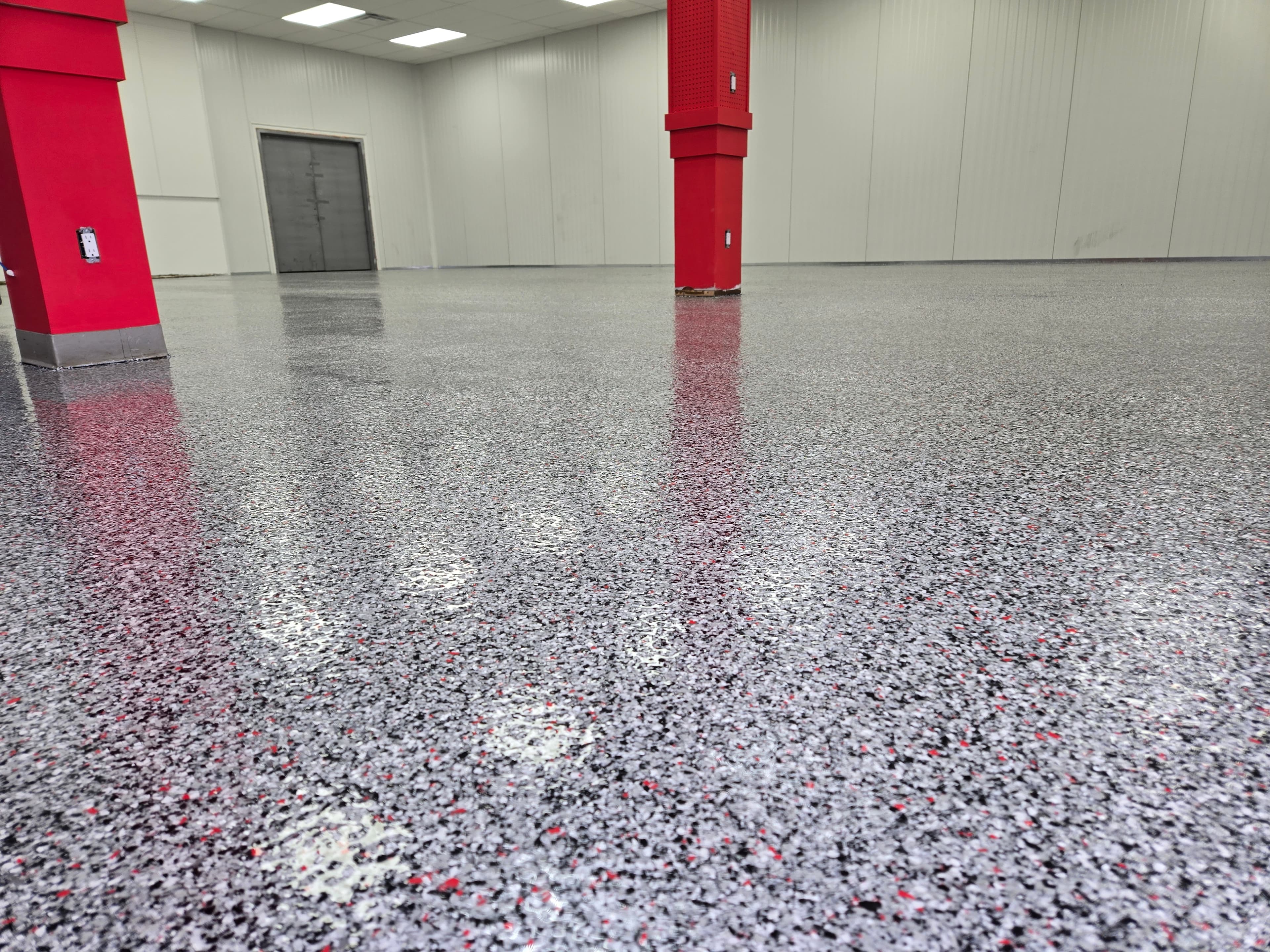 Decorative epoxy flake coating application on garage floor in Windsor Ontario by Preferred Coating Solutions
