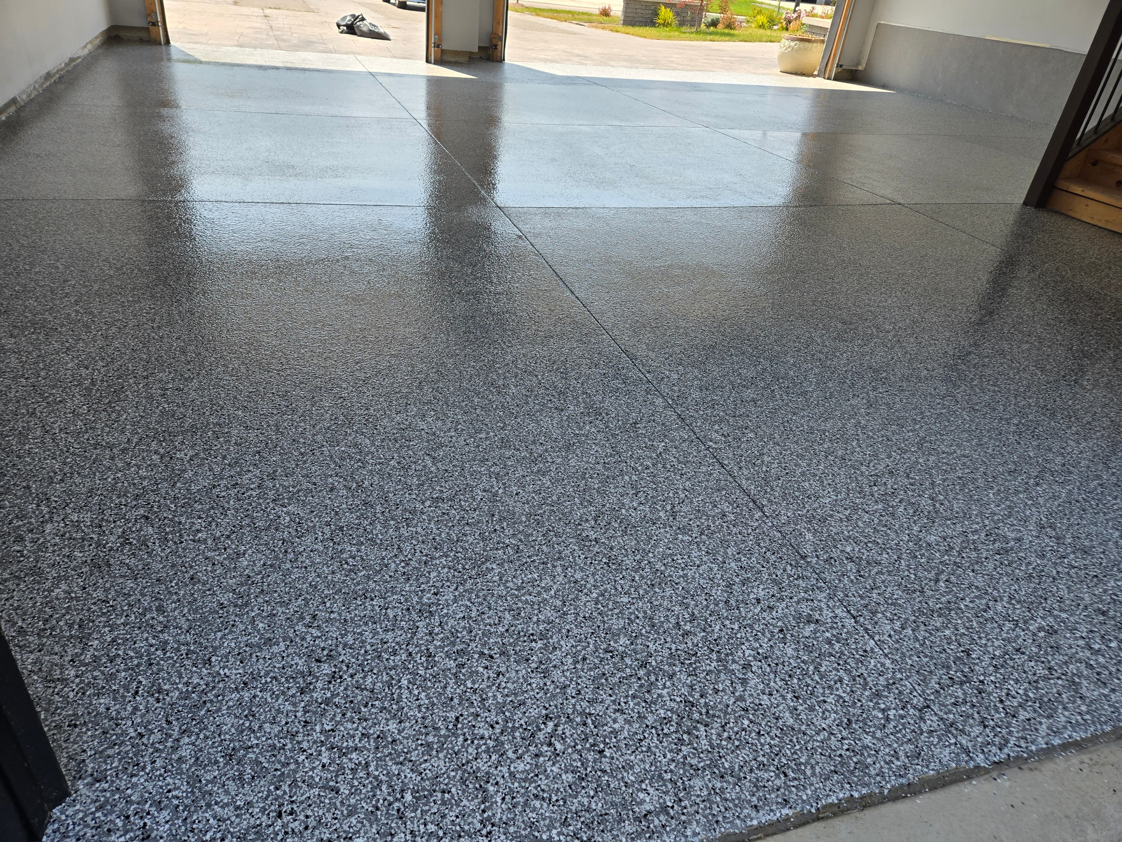 High-gloss epoxy finish on residential floor in Windsor Ontario by Preferred Coating Solutions