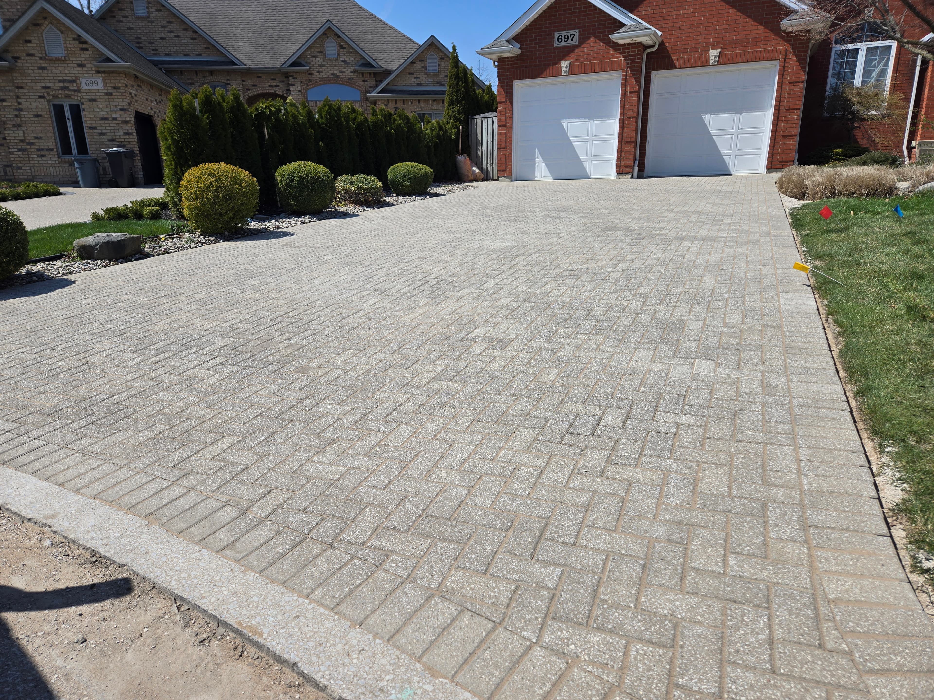 Interlock paver re-levelling and repair in Windsor Ontario by Preferred Coating Solutions