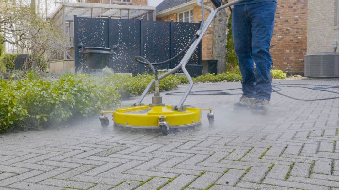 Professional power washing results showing clean concrete surface in Windsor-Essex County